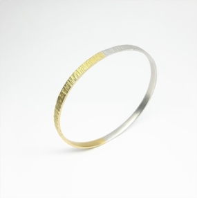 "all-round", bracelet en or jaune 18kt et argent 925/-. 